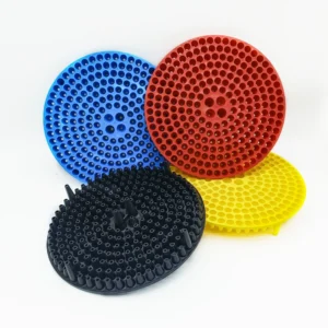 Bucket grit guard inserts shown in yellow red blue and black